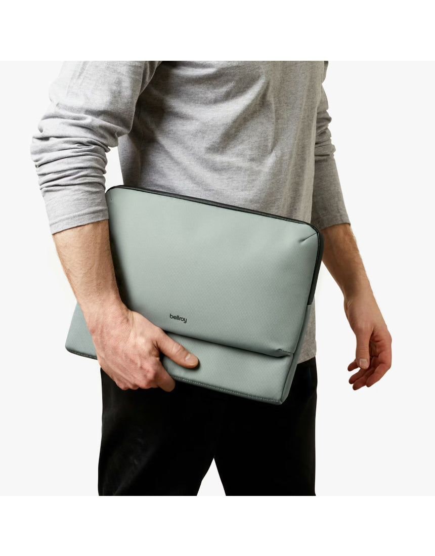 Bellroy Laptop Caddy 14-inch in Eucalyptus color, showing a sleek, organized carry case with multiple compartments for tech accessories.