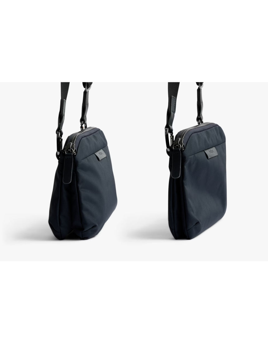 Bellroy Tokyo Side Bag in navy, a sleek crossbody bag with adjustable strap and multiple compartments, designed for everyday use.