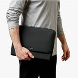 Black Bellroy 14-inch Laptop Caddy with multiple compartments for organizing accessories and laptop in a sleek, minimalist design.