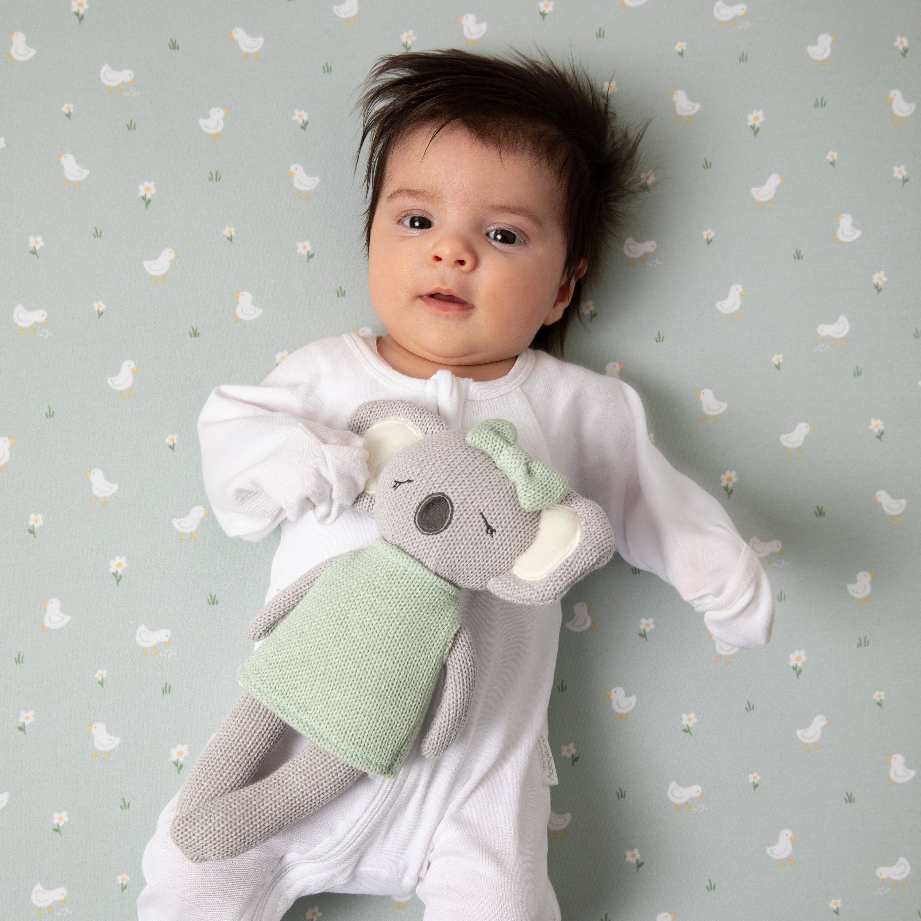 Living Textiles Kimmy the Koala knitted animal toy, soft plush koala with detailed stitching and adorable features.