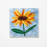 Jones & Co Superette Sunflower Tile wall decor featuring a vibrant sunflower design on a decorative ceramic tile.