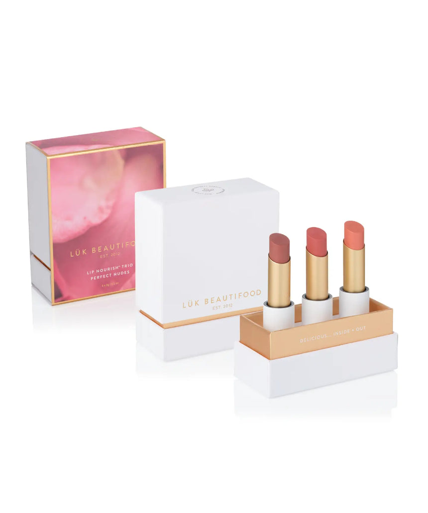 Lük Beautifood Lip Nourish Trio featuring three natural nude lip balms in sleek packaging for soft, nourished lips.