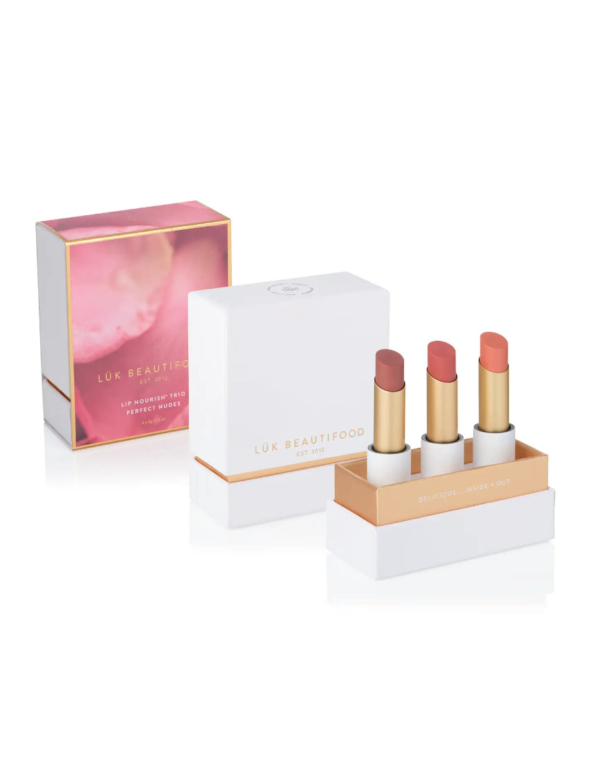 Lük Beautifood Lip Nourish Trio featuring three natural nude lip balms in sleek packaging for soft, nourished lips.