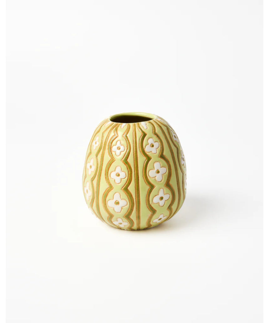 Jones & Co vintage green pollen vase with intricate floral design on tall ceramic body.