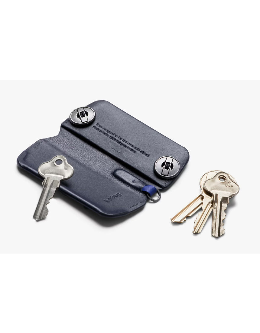 Bellroy Key Cover Plus 3rd Edition in navy, showing a compact leather key organizer with multiple key slots and sleek design.