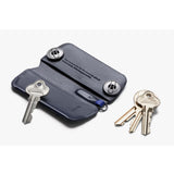 Bellroy Key Cover Plus 3rd Edition in navy, showing a compact leather key organizer with multiple key slots and sleek design.