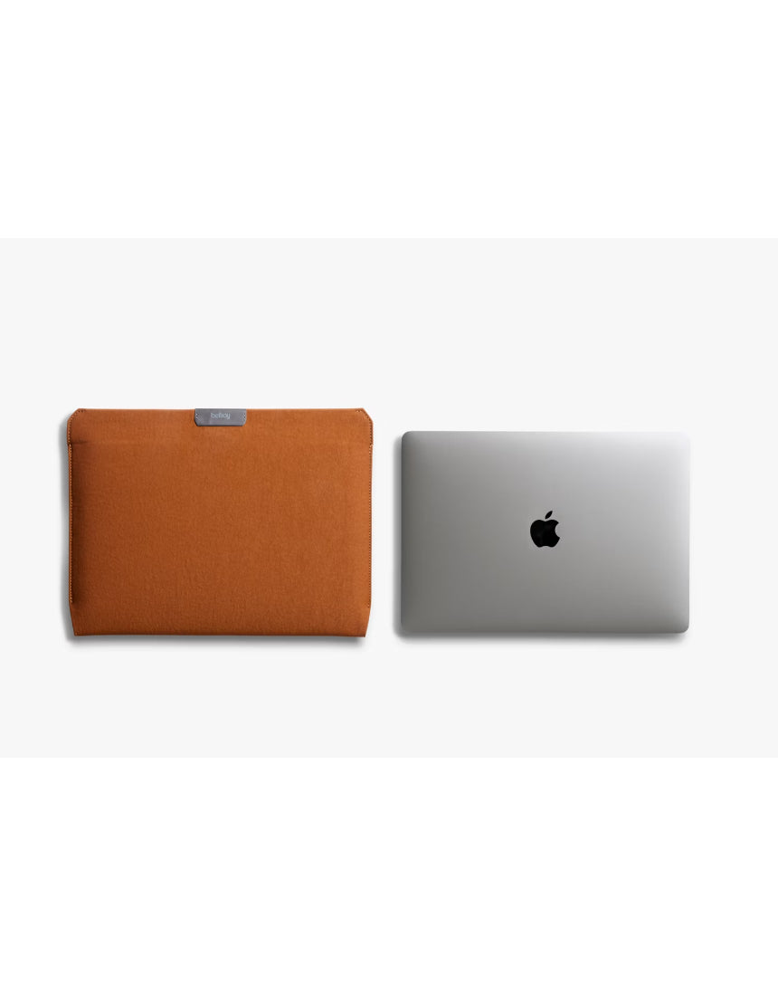 Bellroy 16-inch bronze laptop sleeve with smooth exterior and padded interior for protectively carrying a laptop.