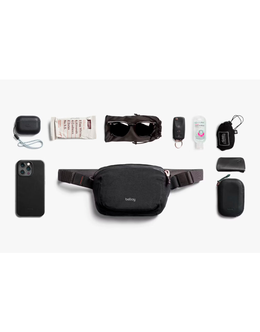 Bellroy Lite Belt Bag in black with adjustable strap and compact design, ideal for carrying essentials comfortably.