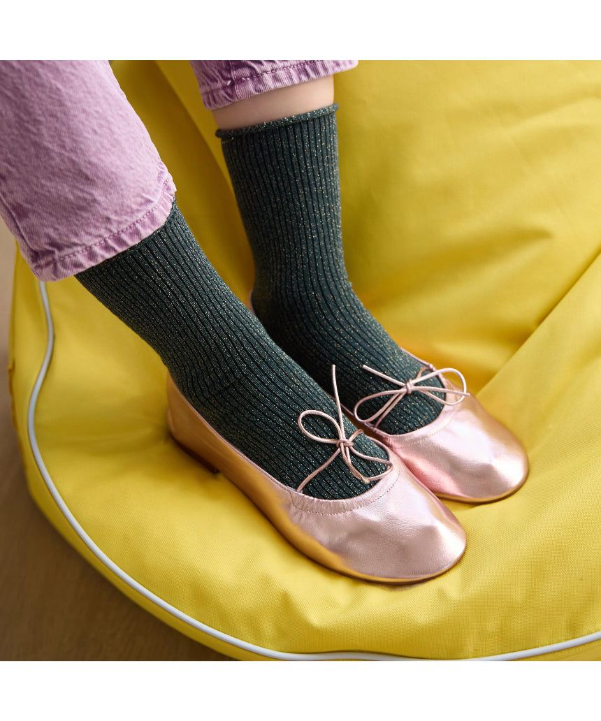Green glitter lurex socks by Klue featuring shiny, textured fabric and a comfortable fit.