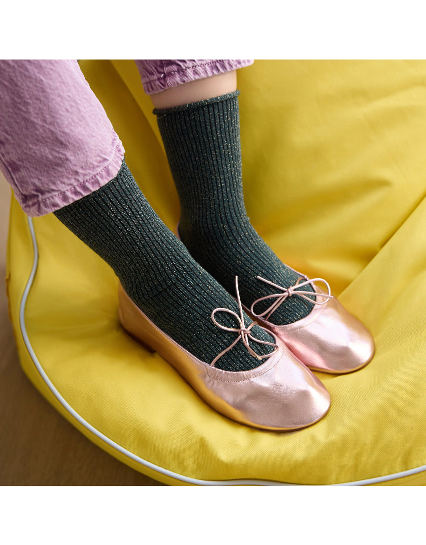 Green glitter lurex socks by Klue featuring shiny, textured fabric and a comfortable fit.