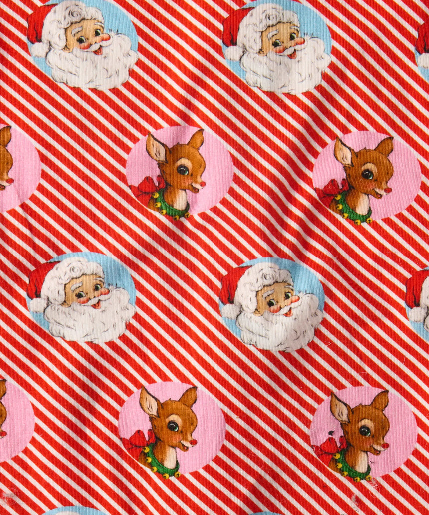 Kip & Co I Love Christmas Spot Cotton Baby Bib with colorful festive print and soft fabric for comfortable wearing.