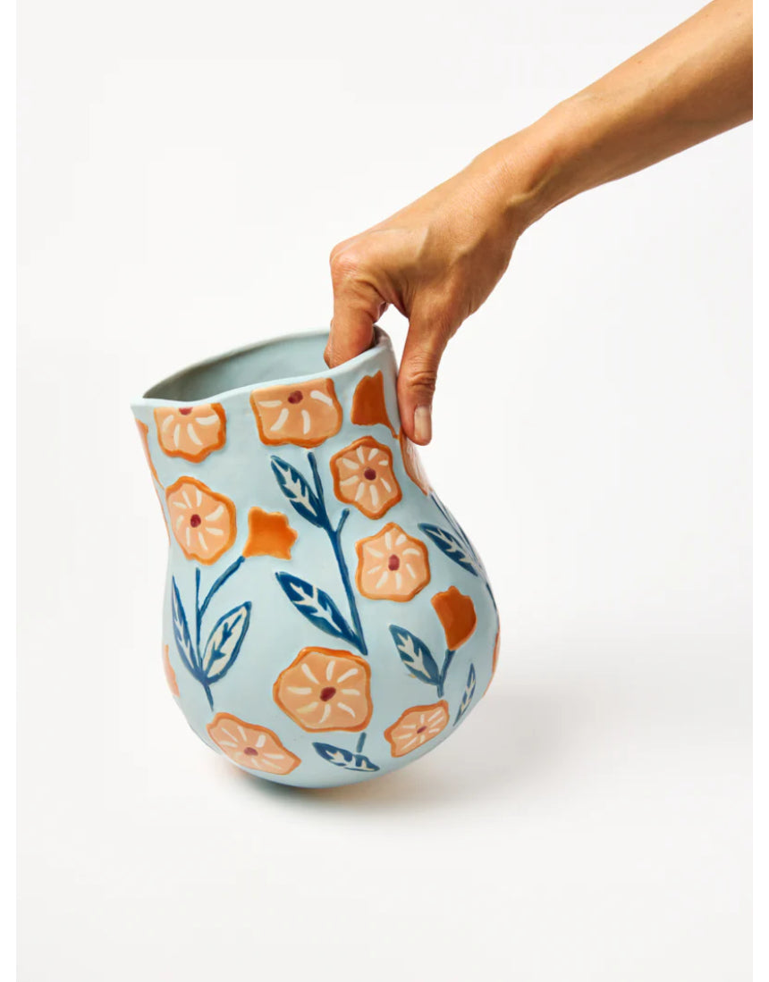 Jones & Co blue Juniper Vase featuring a sleek, modern design with elegant curves and a glossy finish.