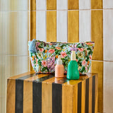 Kip & Co Spring In The Air velvet toiletry bag with floral pattern and pink zipper, accessory for travel and organization.
