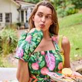 Kip & Co veggie soup apron with colorful vegetable print, cotton fabric, ties at the neck and waist, perfect for cooking and kitchen use.