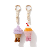 Living Textiles stroller toys set featuring plush ice cream and cupcake shapes for infant entertainment and sensory play.