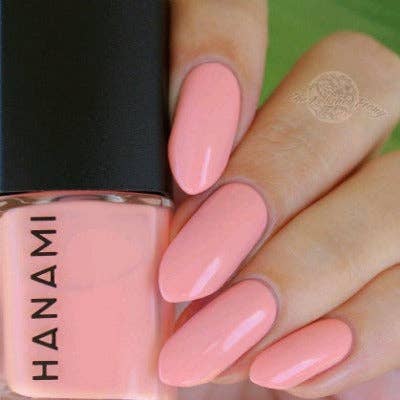Hanami Cosmetics Nail Polish in April Sun In Cuba with bright yellow color and smooth glossy finish.
