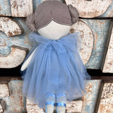 Amaranta Designs ballerina doll with pink tutu, long brown hair, and delicate facial features, dressed in a graceful ballet pose.