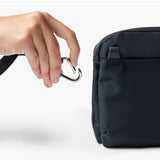 Bellroy Tokyo Side Bag in navy, a stylish crossbody bag with multiple compartments and adjustable strap, designed for everyday use.