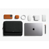 Bellroy 14-inch black laptop caddy with handle and multiple compartments for organizing accessories and documents.