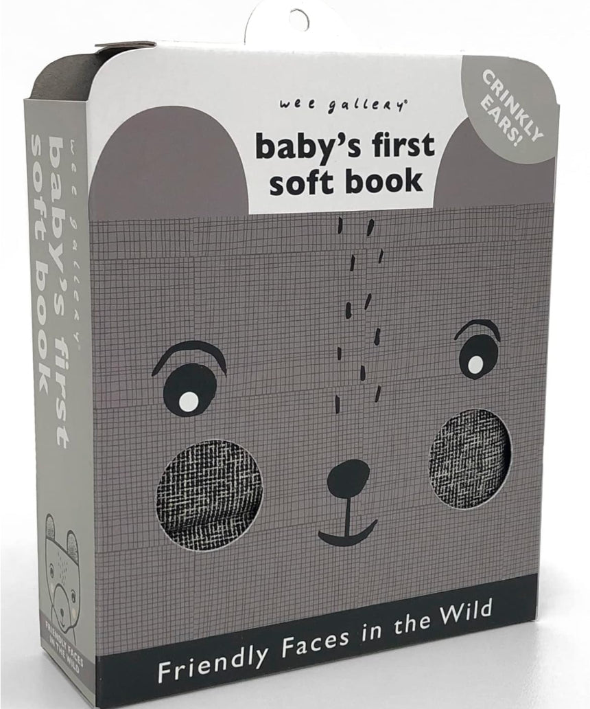 Baby's First Soft Book: Wild by Brumby Sunstate showing colorful fabric pages with animal illustrations for infants.