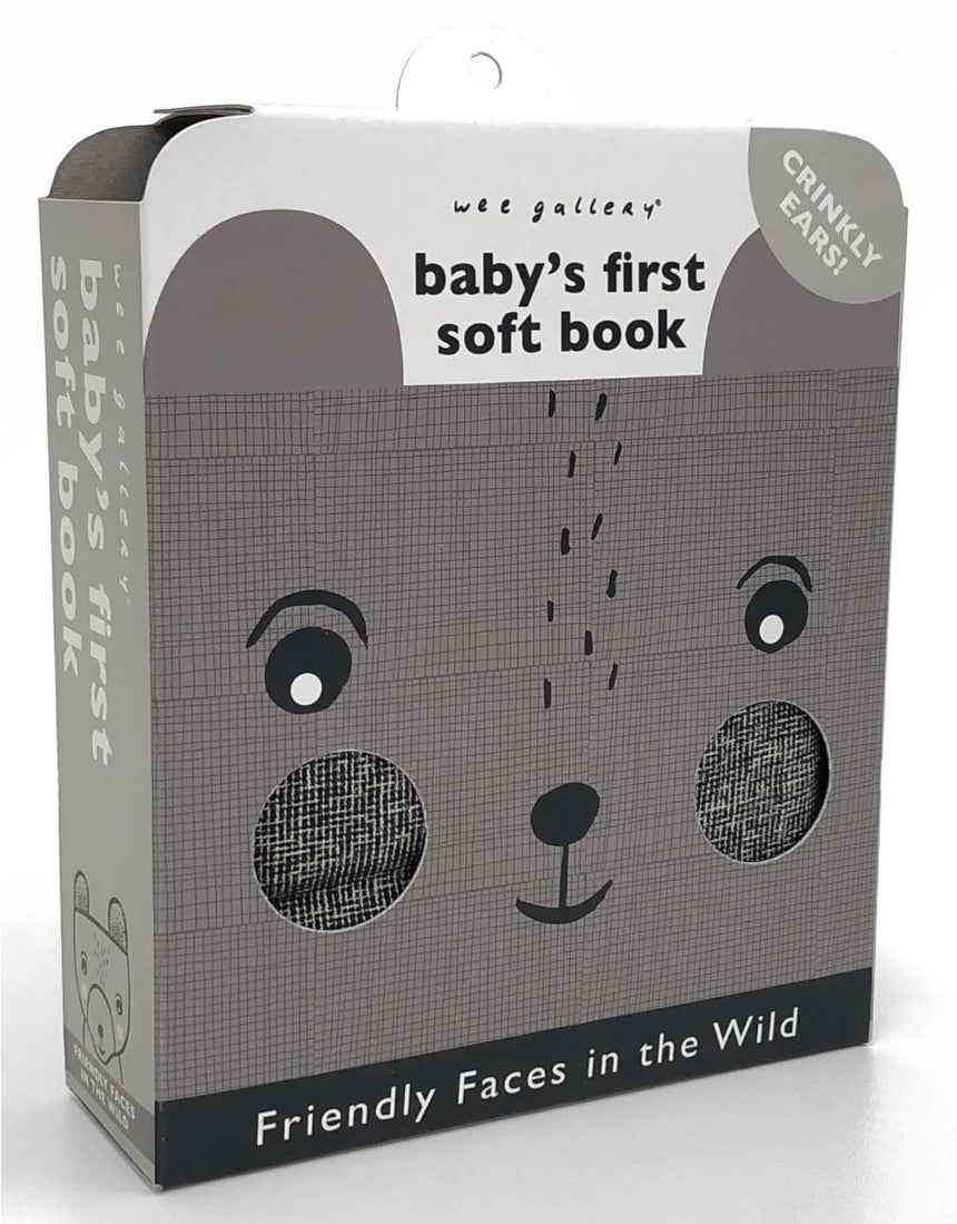 Baby's First Soft Book: Wild by Brumby Sunstate showing colorful fabric pages with animal illustrations for infants.