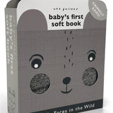 Baby's First Soft Book: Wild by Brumby Sunstate showing colorful fabric pages with animal illustrations for infants.