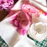 Pink peony floral linen tea towel by Petal & Pins featuring a delicate botanical design.