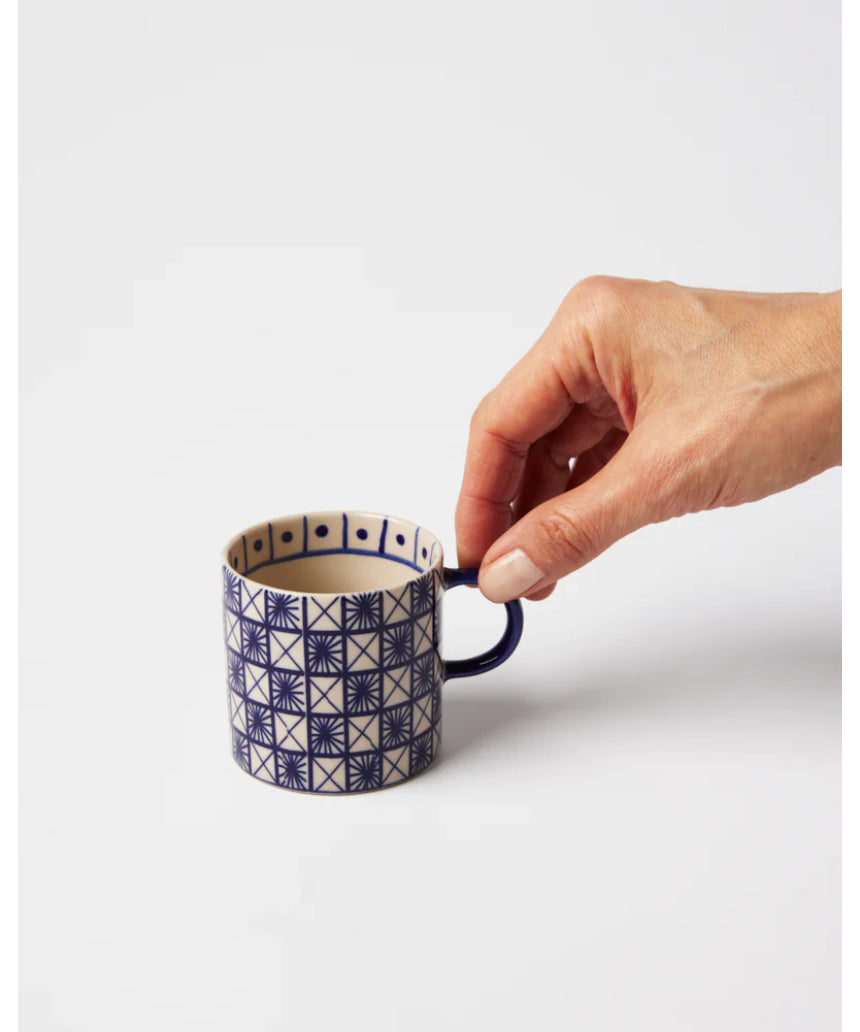 Jones & Co Caravan Espresso Indigo fabric swatch showcasing vibrant blue and beige woven textile pattern.