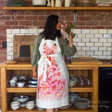 Petal & Pins floral apron featuring a Cécile Brünner rose design with colorful flower patterns on lightweight fabric.