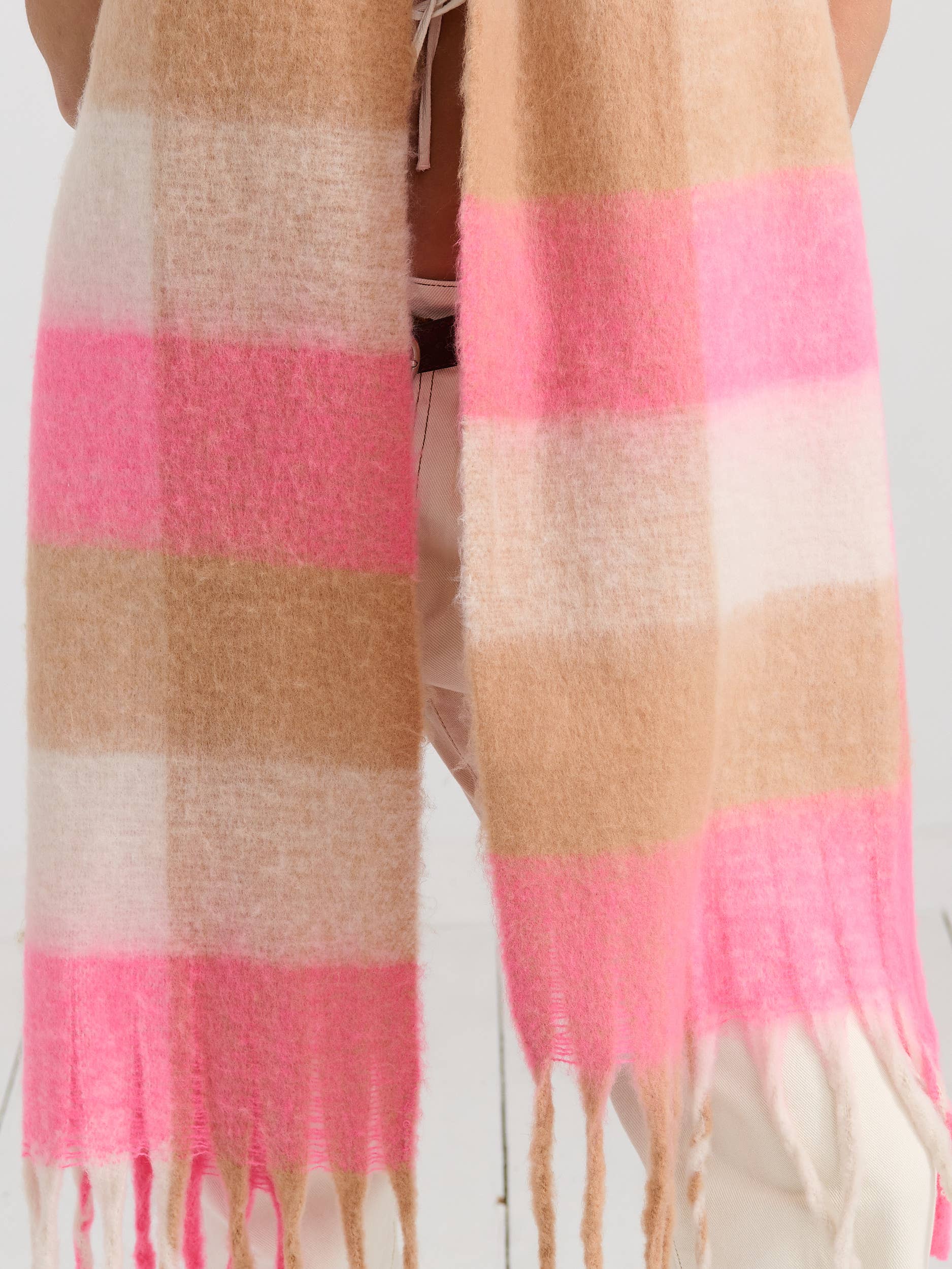 Neon pink checkered fluffy scarf by Angels Whisper Accessories, cozy and stylish accessory for cold weather.