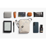 Bellroy City Pouch in Saltbush, a compact bag with multiple compartments for organization, made of durable material.