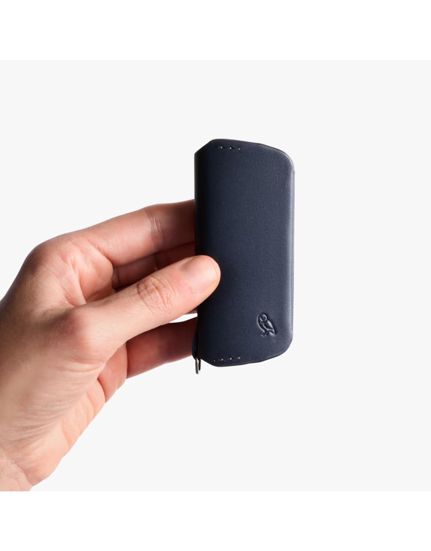Bellroy Key Cover Plus 3rd Edition in navy, showing a compact leather key holder with multiple key hooks and sleek design.