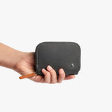 Bellroy Folio Mini wallet in charcoal cobalt, featuring a sleek, compact design with card slots and a cash pocket.