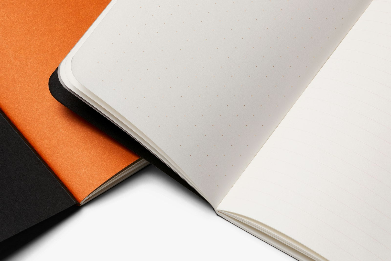 Bellroy caramel notebook cover with sleek leather design, featuring a compact, stylish accessory for organizing notebooks.