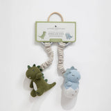 Living Textiles 2-pack dinosaur stroller toys featuring colorful plush dinosaur designs for infants and toddlers.