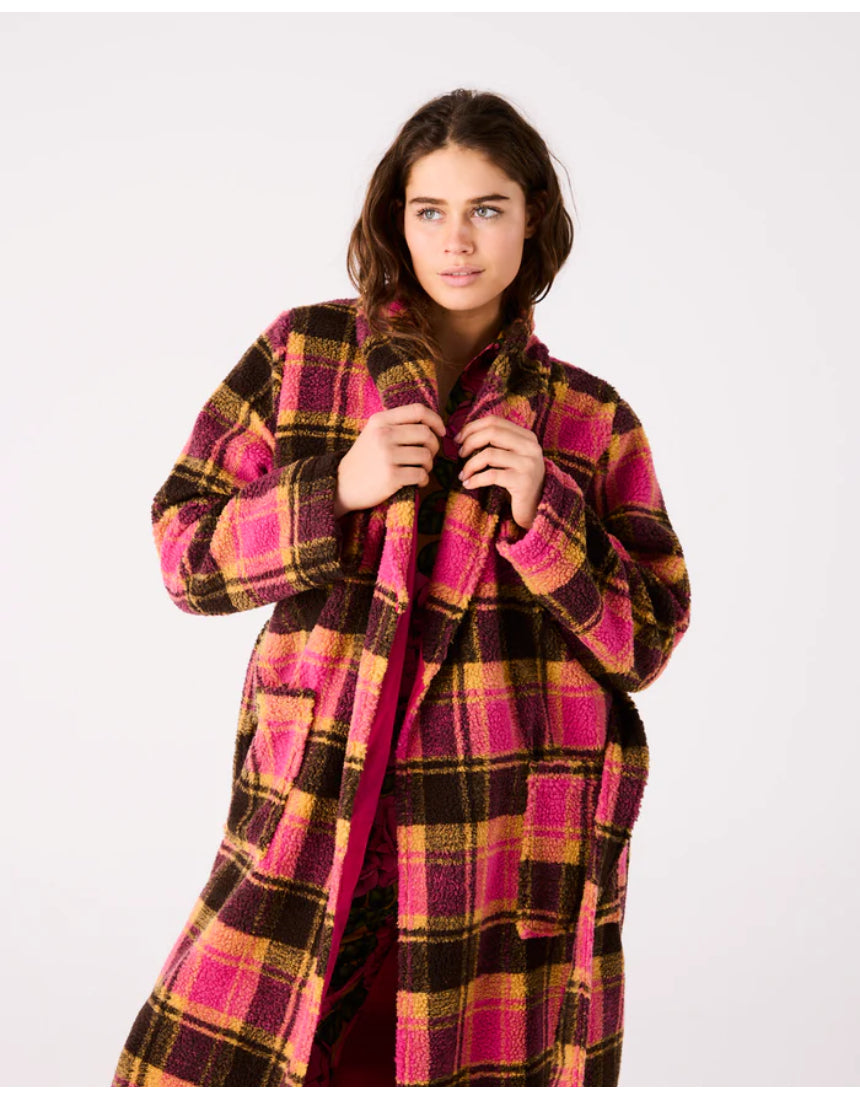 Kip & Co Alaskan adult Sherpa robe in cozy, plush fabric with a relaxed fit and hood, displayed on a hanger.
