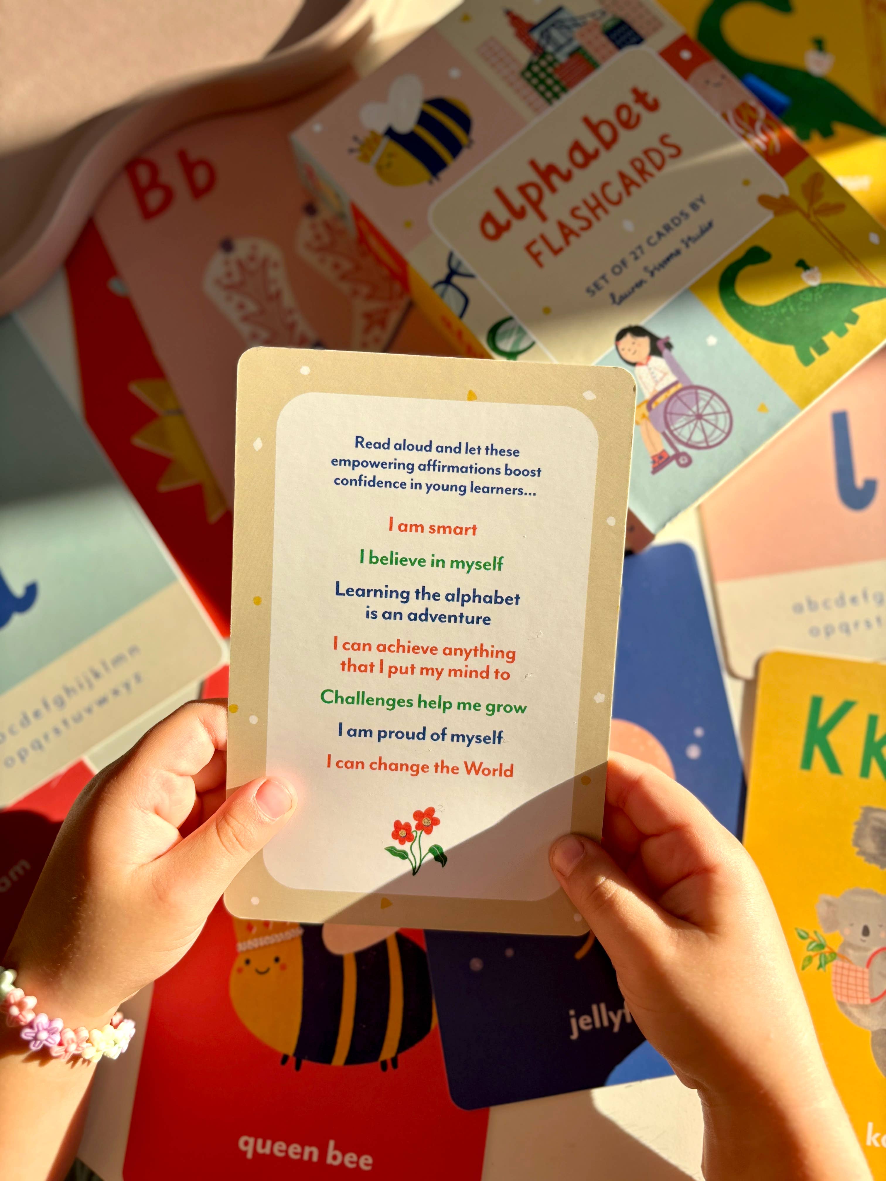 Lauren Sissons Studio A-Z illustrated alphabet flashcards featuring colorful letter designs for young learners.