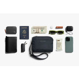 Bellroy Tokyo Side Bag in navy, a stylish crossbody bag with sleek design and adjustable strap, ideal for everyday use.
