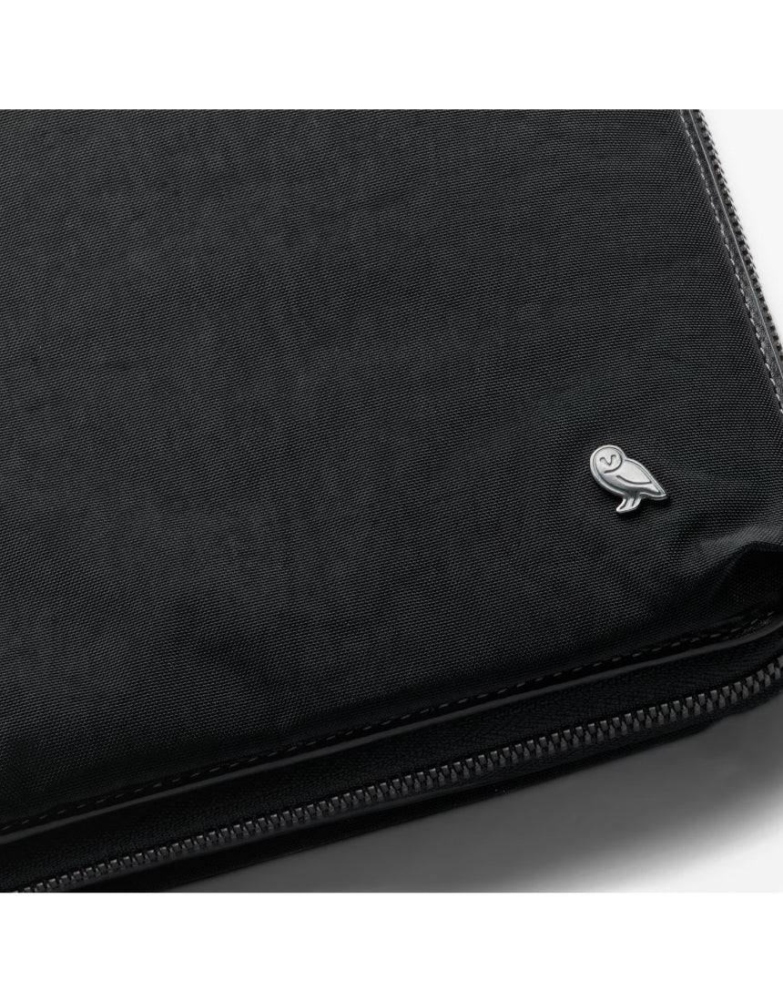 Bellroy Tokyo Folio 12.9-inch Raven leather tablet and document organizer with multiple compartments and sleek design.