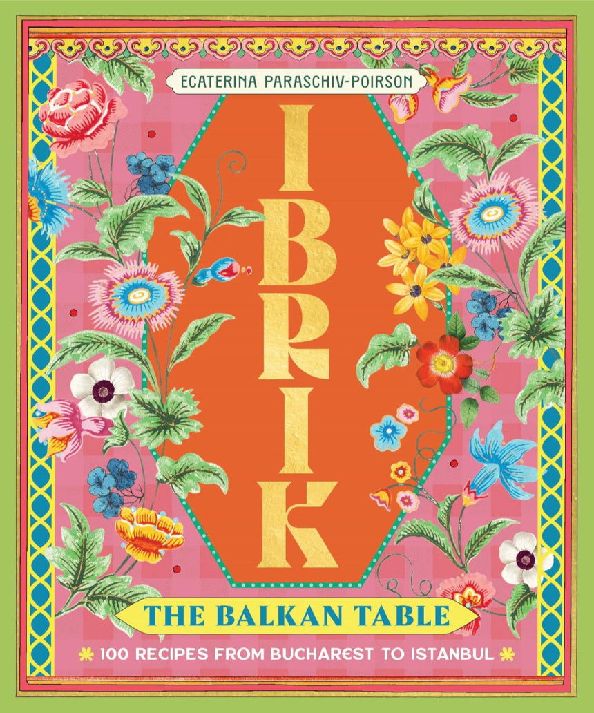 Ibrik coffee pot from Brumby Sunstate on a wooden table with a book titled "The Balkan Table" featuring 100 recipes from Bucharest to Istanbul.