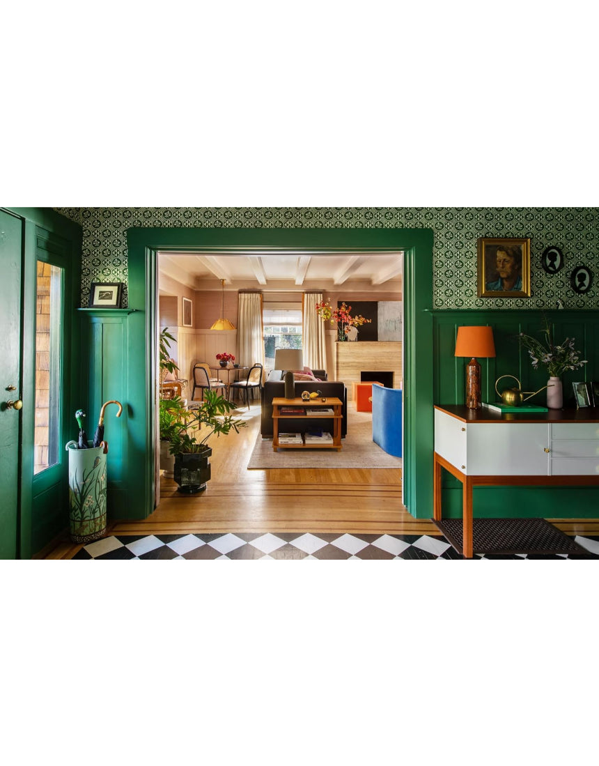 Interior photo of a cozy living room with stylish furniture and warm lighting from "This Must Be The Place - Homes With Atmosphere" by Brumby Sunstate