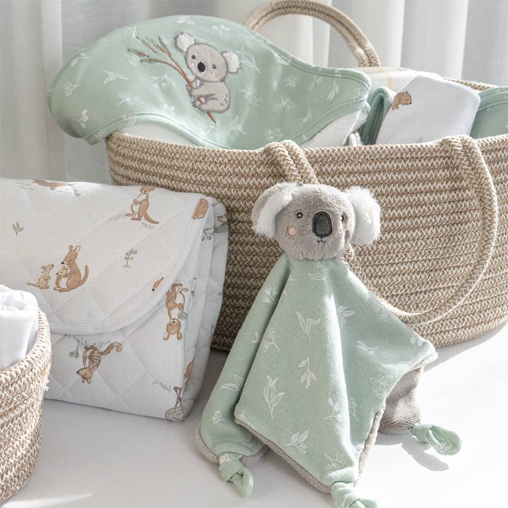 Living Textiles waterproof travel change mat featuring Australiana-themed fabric, ideal for on-the-go diaper changes.