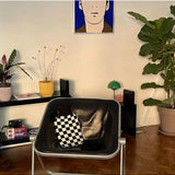 Casa Rolio hot water bottle with black cover, cozy and soft fabric, designed for warmth and comfort.