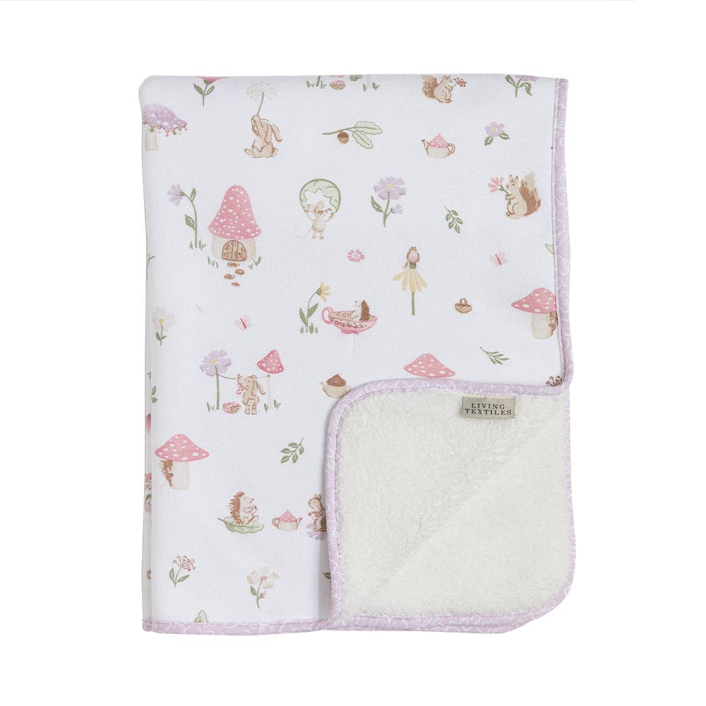 Living Textiles Jersey Sherpa Pram Blanket in Whimsical Wonderland with soft jersey fabric and cozy sherpa lining for babies.