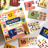 Lauren Sissons Studio Number Puzzle Pairs, colorful educational toy with numbered wooden pieces for children.