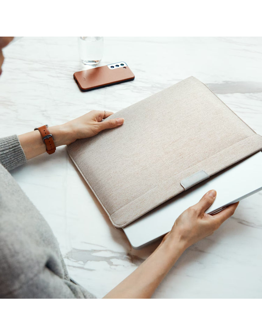 Bellroy 16-inch bronze laptop sleeve showing sleek, padded design with a smooth exterior and subtle branding.