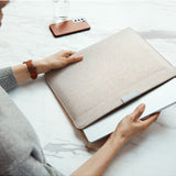 Bellroy 16-inch bronze laptop sleeve showing sleek, padded design with a smooth exterior and subtle branding.
