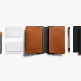 Bellroy notebook cover in caramel leather, showing a sleek, compact design with a smooth texture and subtle stitching details.