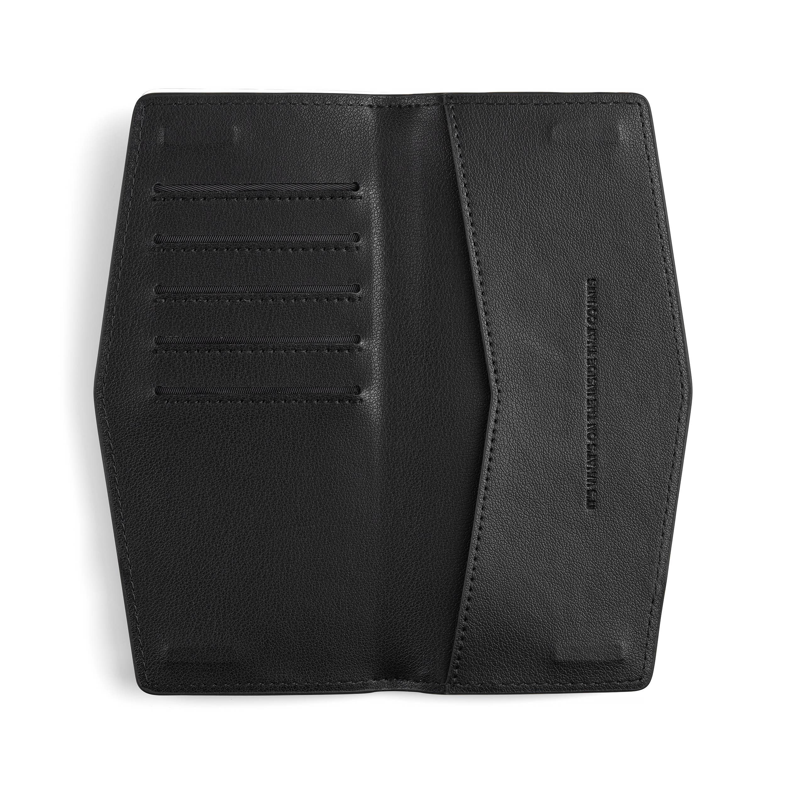 Black Fox & Leo Swallet backpack with adjustable straps and front pocket, featuring a sleek, modern design.