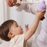 Living Textiles stroller toys featuring plush ice cream and cupcake designs for baby entertainment and sensory development.
